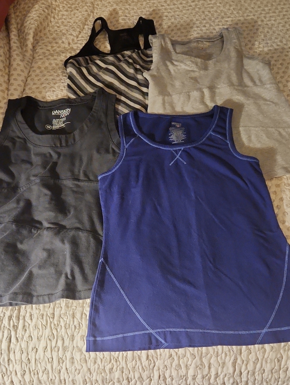 Four Danskin Now Athletic Tanks